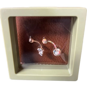 Set of 2 belly‎ rings.